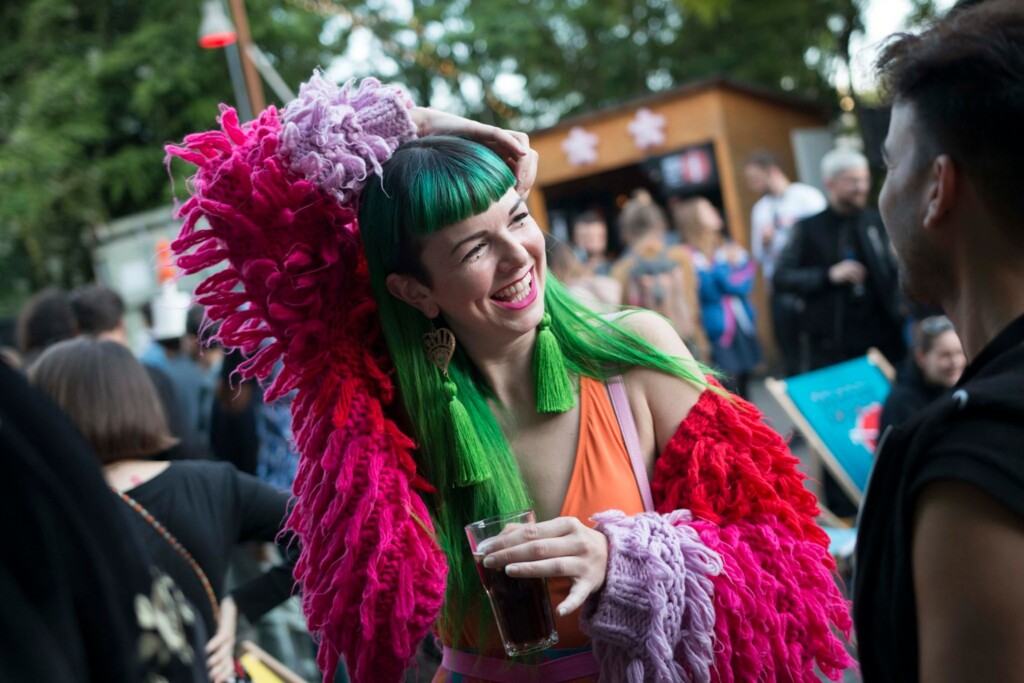 girl-green-hair-colorful-fringe-jacket-outdoor-bmva